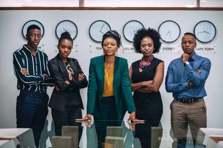 a team of people in an office setting